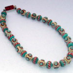 Lampwork glass beads with vintage bakelite domino clasp