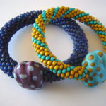 Crochet bead and lamp work bracelet