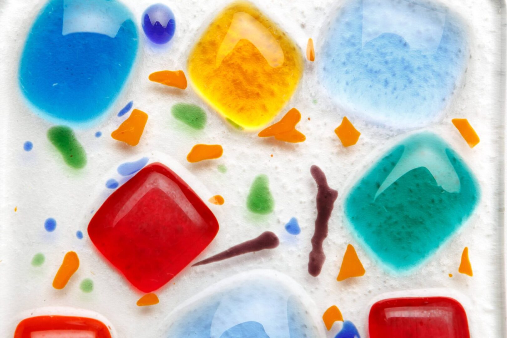 Multicolored glass pieces with abstract pattern