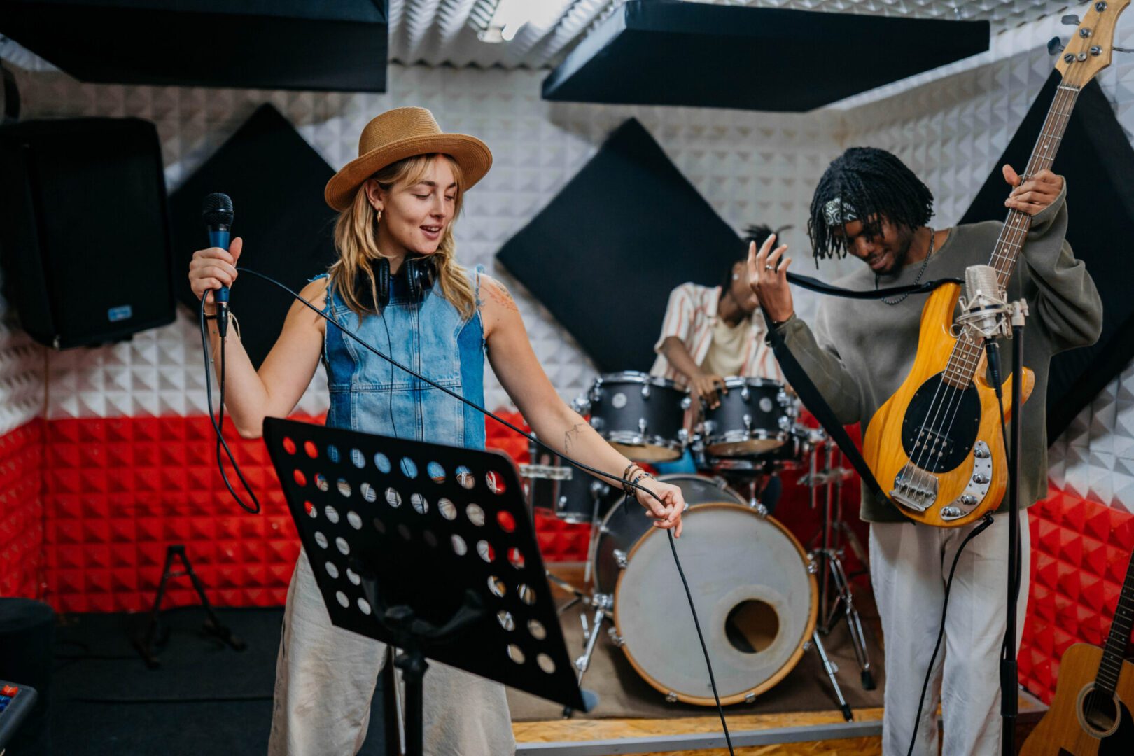 Musicians rehearsing in a recording studio